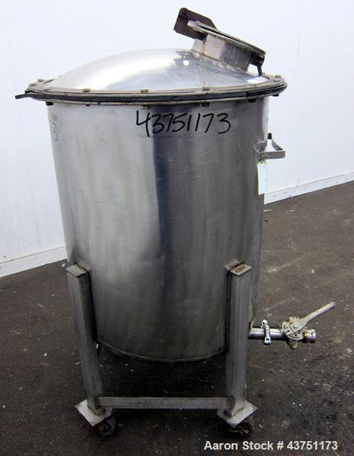 Used Tank, 100 Gallon, 304 Stainless Steel, Vertical.  30" Diameter x 34" straight side.  Dished bolt-on top with an 8" hand hole with cover, 2" sloped bottom.  2" Tri-clamp off center bottom outlet....