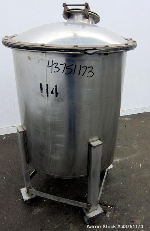 Used Tank, 100 Gallon, 304 Stainless Steel, Vertical.  30" Diameter x 34" straight side.  Dished bolt-on top with an 8" hand hole with cover, 2" sloped bottom.  2" Tri-clamp off center bottom outlet....