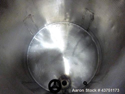 Used Tank, 100 Gallon, 304 Stainless Steel, Vertical.  30" Diameter x 34" straight side.  Dished bolt-on top with an 8" hand hole with cover, 2" sloped bottom.  2" Tri-clamp off center bottom outlet....