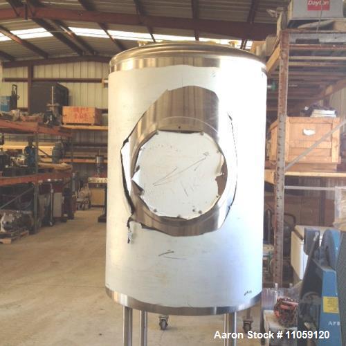 Unused- Sanitary Construction Tank, Approximately 200 Gallon, Vertical. Dish top and bottom. Mounted on 3' legs. Approximate...