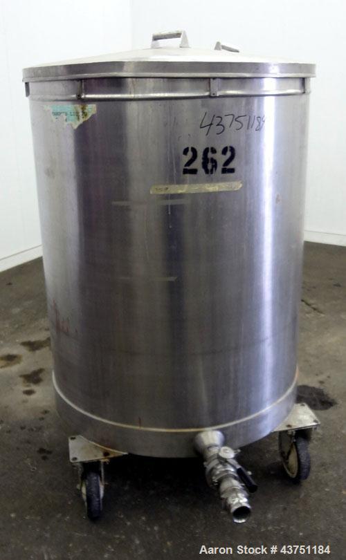 Used Tank, 200 Gallon, 304 Stainless Steel, Vertical.  Approximately 38" diameter x 47" straight side.  Open top with a 1 piece cover, 1/2" sloped bottom. 2-1/4" Side bottom outlet.  Skirt mounted wi...
