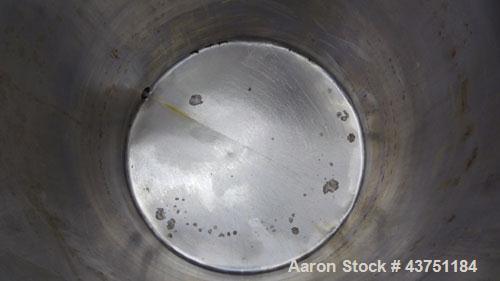 Used Tank, 200 Gallon, 304 Stainless Steel, Vertical.  Approximately 38" diameter x 47" straight side.  Open top with a 1 piece cover, 1/2" sloped bottom. 2-1/4" Side bottom outlet.  Skirt mounted wi...