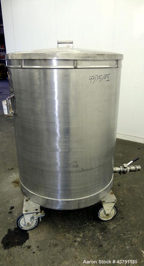 Used Tank, 200 Gallon, 304 Stainless Steel, Vertical.  Approximately 38" diameter x 47" straight side.  Open top with a 1 piece cover, 1/2" sloped bottom. 2-1/4" Side bottom outlet.  Skirt mounted wi...