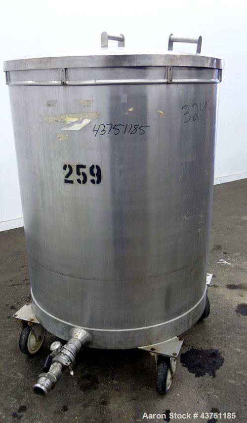 Used Tank, 200 Gallon, 304 Stainless Steel, Vertical.  Approximately 38" diameter x 47" straight side.  Open top with a 1 piece cover, 1/2" sloped bottom. 2-1/4" Side bottom outlet.  Skirt mounted wi...