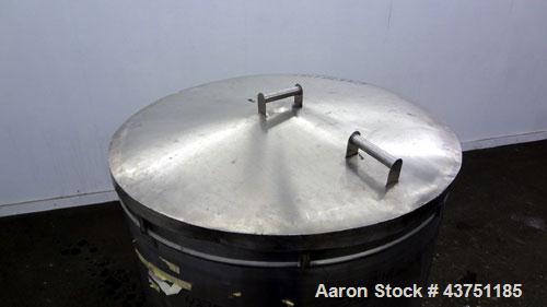 Used Tank, 200 Gallon, 304 Stainless Steel, Vertical.  Approximately 38" diameter x 47" straight side.  Open top with a 1 piece cover, 1/2" sloped bottom. 2-1/4" Side bottom outlet.  Skirt mounted wi...