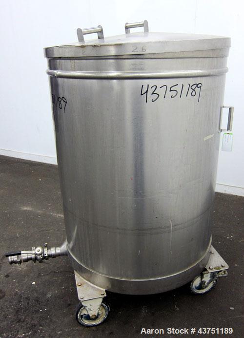 Used Tank, 200 Gallon, 304 Stainless Steel, Vertical.  Approximately 38" diameter x 47" straight side.  Open top with a 1 piece cover, 1/2" sloped bottom. 2-1/4" Side bottom outlet.  Skirt mounted wi...
