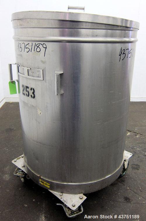 Used Tank, 200 Gallon, 304 Stainless Steel, Vertical.  Approximately 38" diameter x 47" straight side.  Open top with a 1 piece cover, 1/2" sloped bottom. 2-1/4" Side bottom outlet.  Skirt mounted wi...