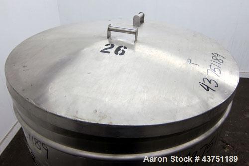 Used Tank, 200 Gallon, 304 Stainless Steel, Vertical.  Approximately 38" diameter x 47" straight side.  Open top with a 1 piece cover, 1/2" sloped bottom. 2-1/4" Side bottom outlet.  Skirt mounted wi...