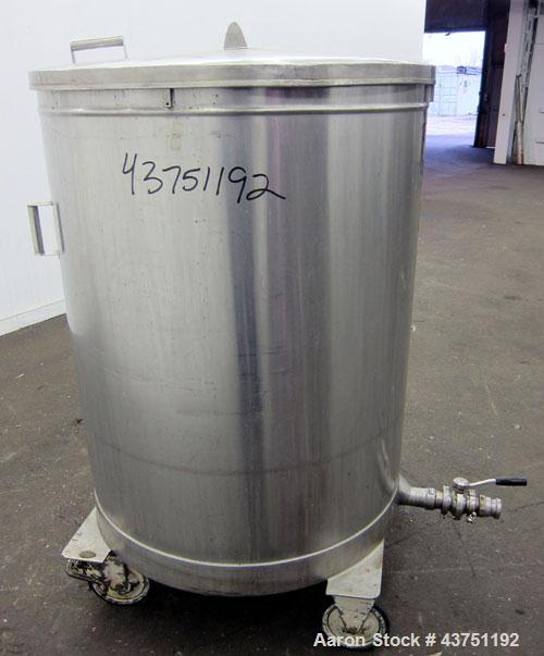 Used Tank, 200 Gallon, 304 Stainless Steel, Vertical. Approximate 38" diameter x 47" straight side. Open top with a 1 piece cover, 1/2" sloped bottom. 2-1/4" Side bottom outlet. Skirt mounted with ca...