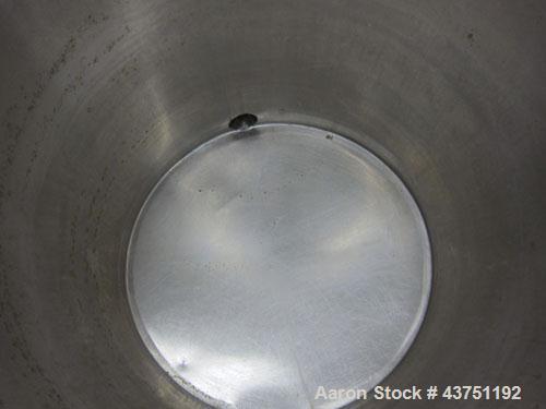 Used Tank, 200 Gallon, 304 Stainless Steel, Vertical. Approximate 38" diameter x 47" straight side. Open top with a 1 piece cover, 1/2" sloped bottom. 2-1/4" Side bottom outlet. Skirt mounted with ca...