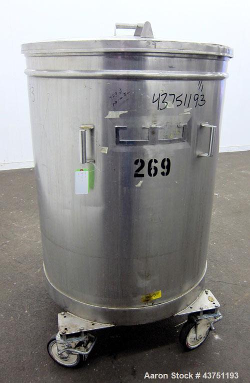Used Tank, 200 Gallon, 304 Stainless Steel, Vertical. Approximate 38" diameter x 47" straight side. Open top with a 1 piece cover, 1/2" sloped bottom. 2-1/4" Side bottom outlet. Skirt mounted with ca...
