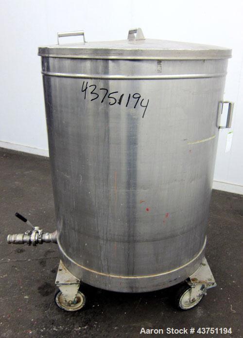 Used Tank, 200 Gallon, 304 Stainless Steel, Vertical.  Approximately 38" diameter x 47" straight side.  Open top with a 1 piece cover, 1/2" sloped bottom. 2-1/4" Side bottom outlet.  Skirt mounted wi...