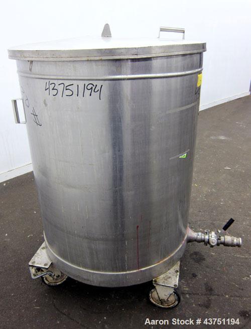 Used Tank, 200 Gallon, 304 Stainless Steel, Vertical.  Approximately 38" diameter x 47" straight side.  Open top with a 1 piece cover, 1/2" sloped bottom. 2-1/4" Side bottom outlet.  Skirt mounted wi...
