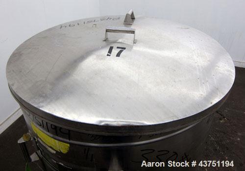 Used Tank, 200 Gallon, 304 Stainless Steel, Vertical.  Approximately 38" diameter x 47" straight side.  Open top with a 1 piece cover, 1/2" sloped bottom. 2-1/4" Side bottom outlet.  Skirt mounted wi...