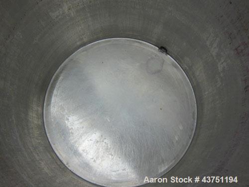 Used Tank, 200 Gallon, 304 Stainless Steel, Vertical.  Approximately 38" diameter x 47" straight side.  Open top with a 1 piece cover, 1/2" sloped bottom. 2-1/4" Side bottom outlet.  Skirt mounted wi...