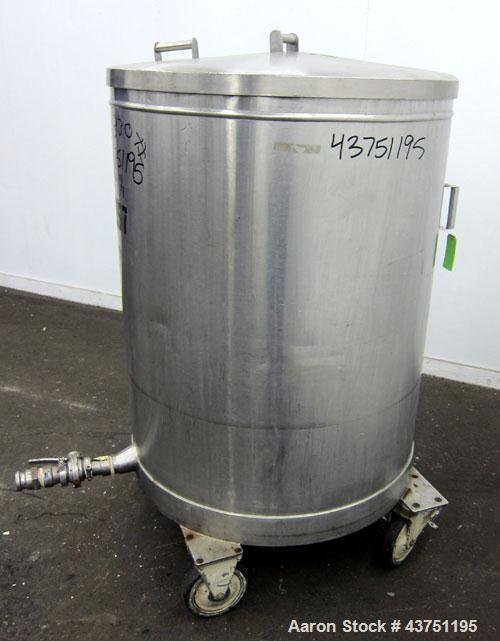 Used Tank, 200 Gallon, 304 Stainless Steel, Vertical.  Approximately 38" diameter x 47" straight side.  Open top with a 1 piece cover, 1/2" sloped bottom. 2-1/4" Side bottom outlet.  Skirt mounted wi...