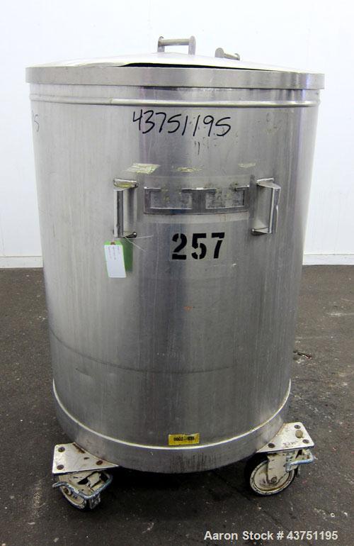 Used Tank, 200 Gallon, 304 Stainless Steel, Vertical.  Approximately 38" diameter x 47" straight side.  Open top with a 1 piece cover, 1/2" sloped bottom. 2-1/4" Side bottom outlet.  Skirt mounted wi...