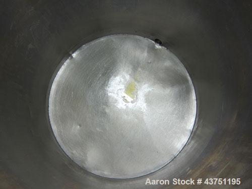 Used Tank, 200 Gallon, 304 Stainless Steel, Vertical.  Approximately 38" diameter x 47" straight side.  Open top with a 1 piece cover, 1/2" sloped bottom. 2-1/4" Side bottom outlet.  Skirt mounted wi...