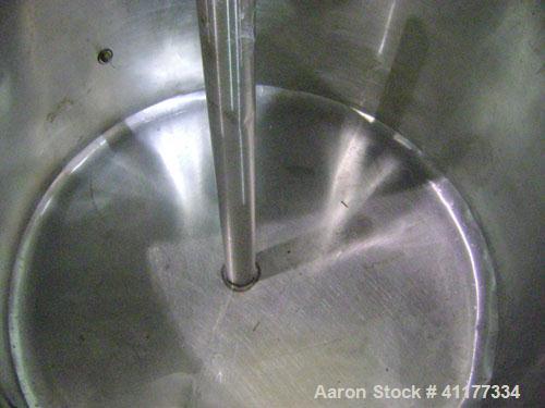 Used 300 Gallon stainless steel single wall open top tank. Has stainless steel hip sockets. Has center bottom outlet.