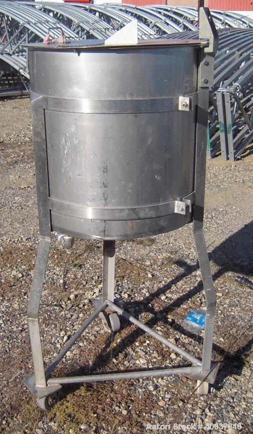 Used Alsop Tank, 30 gallon, stainless steel, vertical. 21" diameter x 22" straight side. Flat top with a 1/3 hinged cover, inverted dished bottom. Provision for a clamp on agitator. 1 1/4" off center...