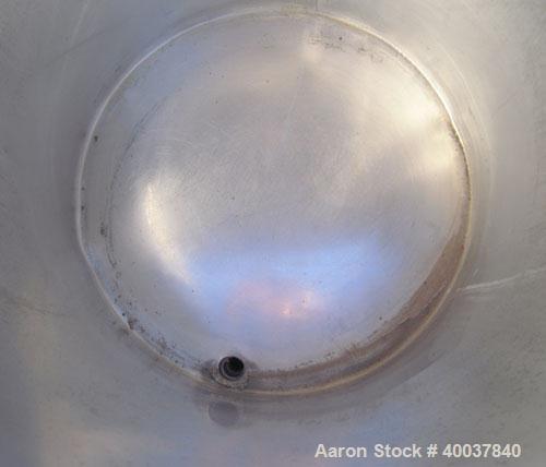 Used Alsop Tank, 30 gallon, stainless steel, vertical. 21" diameter x 22" straight side. Flat top with a 1/3 hinged cover, inverted dished bottom. Provision for a clamp on agitator. 1 1/4" off center...