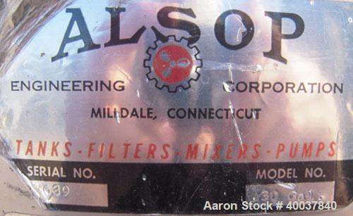 Used Alsop Tank, 30 gallon, stainless steel, vertical. 21" diameter x 22" straight side. Flat top with a 1/3 hinged cover, inverted dished bottom. Provision for a clamp on agitator. 1 1/4" off center...