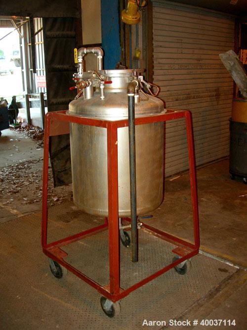 Used Used: O.G. Kelley Co. Pressure Tank, 55 gallon, stainless steel, vertical. 24" diameter x 27" straight side, dished top and bottom. Internal rated 50 psi at 300 deg.f.. Openings top 10" with cov...