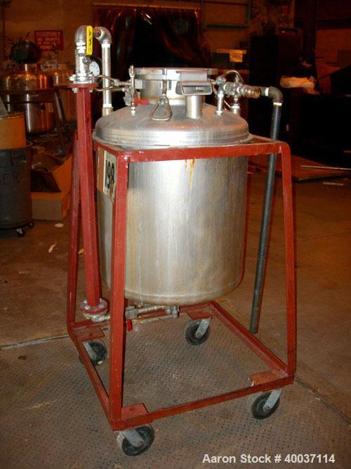 Used Used: O.G. Kelley Co. Pressure Tank, 55 gallon, stainless steel, vertical. 24" diameter x 27" straight side, dished top and bottom. Internal rated 50 psi at 300 deg.f.. Openings top 10" with cov...