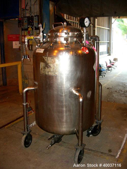 Used Used: Walker Stainless Pressure Tank, 150 gallon, 316 L stainless steel, vertical. 34" diameter x 39" straight side, dished top and bottom. Internal rated FV/120 psi at 300 deg.f.. Openings top ...