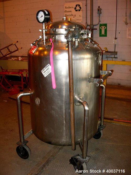 Used Used: Walker Stainless Pressure Tank, 150 gallon, 316 L stainless steel, vertical. 34" diameter x 39" straight side, dished top and bottom. Internal rated FV/120 psi at 300 deg.f.. Openings top ...