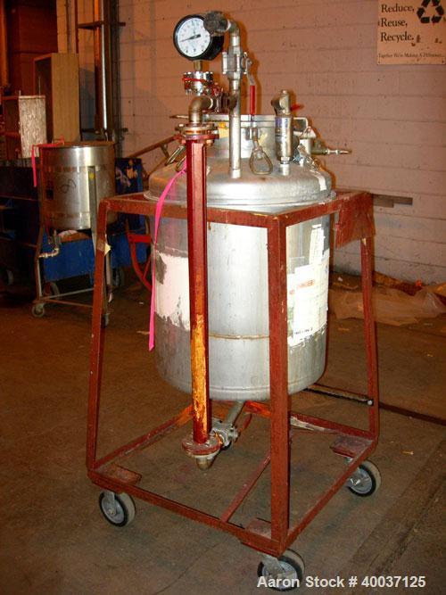 Used Used: O.G. Kelley Co. Pressure Tank, 55 gallon, stainless steel, vertical. 24" diameter x 27" straight side, dished top and bottom. Internal rated 50 psi at 300 deg.f.. Openings top 10" with cov...