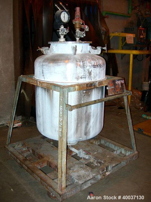 Used Used: Javo N.V. Alkmaar pressure tank, 100 gallon, stainless steel, vertical. 30" diameter x 30" straight side, dished top and bottom. Internal rated 50 psi at 300 degf.. 15" top manway with cov...