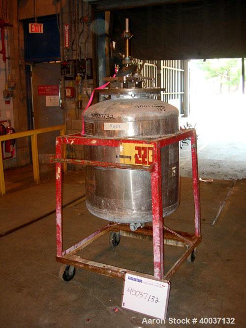 Used Used: Buckley Iron Works pressure tank, 100 gallon, stainless steel, vertical. 30" diameter x 30" straight side, dished top and bottom. Internal rated 50 psi at 300 degf.. 12" top manway with co...