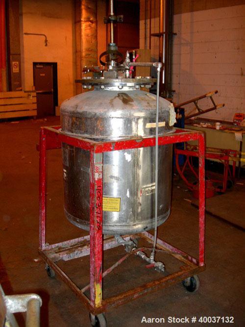 Used Used: Buckley Iron Works pressure tank, 100 gallon, stainless steel, vertical. 30" diameter x 30" straight side, dished top and bottom. Internal rated 50 psi at 300 degf.. 12" top manway with co...