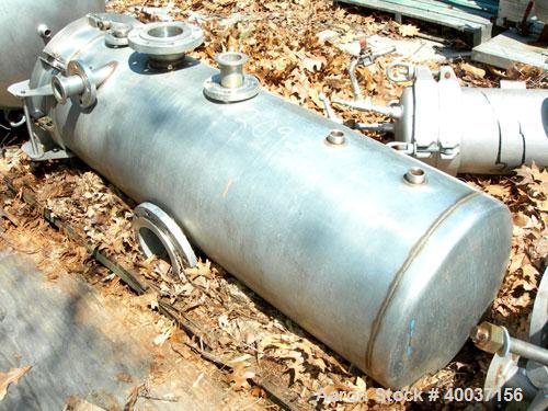 Used Used: Designers Fabricators tank, 80 gallon, stainless steel, vertical. 20" diameter x 56" straight side, slight dished bolt on top, dished bottom. Intenal rated 5 psi at 200 deg.f.. Openings si...