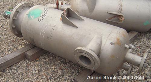 Used Acme Industrial Pressure Tank, 44 gallon, stainless steel, vertical. Approximately 18" diameter x 36" straight side. Dished top, flat bolt on bottom. Internal rated 150/fv at 325 deg F. Openings...