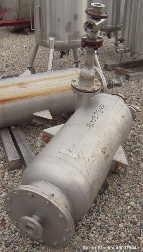 Used Acme Industrial Pressure Tank, 44 gallon, stainless steel, vertical. Approximately 18" diameter x 36" straight side. Dished top, flat bolt on bottom. Internal rated 150/fv at 325 deg F. Openings...