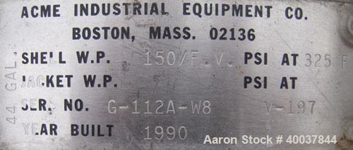 Used Acme Industrial Pressure Tank, 44 gallon, stainless steel, vertical. Approximately 18" diameter x 36" straight side. Dished top, flat bolt on bottom. Internal rated 150/fv at 325 deg F. Openings...