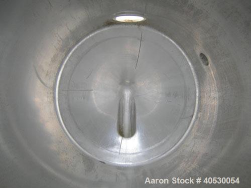 Used - A.B. Separator Tank, 110 gallon, 304 stainless steel. Approximately 24" diameter x 56" straight side. Open top with a cover with (2) openings. Coned bottom. Openings: side 2" tri-clamp, 2 1/2"...