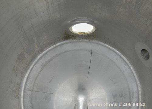 Used - A.B. Separator Tank, 110 gallon, 304 stainless steel. Approximately 24" diameter x 56" straight side. Open top with a cover with (2) openings. Coned bottom. Openings: side 2" tri-clamp, 2 1/2"...