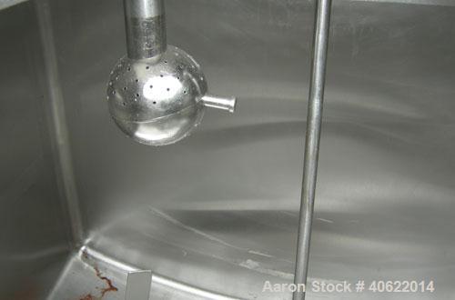 Used Flavor tank, (2) compartment, approximate 250 gallon each, 304 stainless steel.  41" long x 41" wide x approx 34" deep.  U shaped top and bottom.  3/4" diameter shaft with 2 blade bottom sweep a...