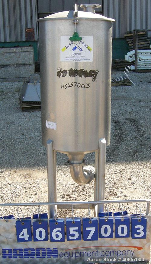 Used Semi-Bulk Systems tank, 45 gallon, 316 stainless steel, vertical. 20" diameter x 34" straight side, dished top cover, coned bottom. 4" center bottom outlet. Mounted on 4 stainless steel legs.