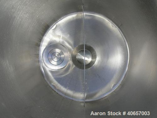 Used Semi-Bulk Systems tank, 45 gallon, 316 stainless steel, vertical. 20" diameter x 34" straight side, dished top cover, coned bottom. 4" center bottom outlet. Mounted on 4 stainless steel legs.