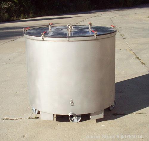 Unused-245 gallon type 304L stainless steel tank. 45" inside diameter x 36" deep. Open top with cover. Flat bottom. On casters. Forklift capable.