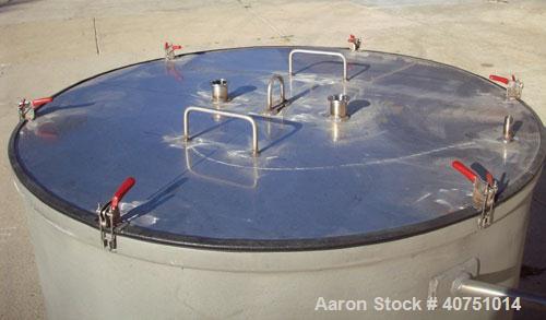 Unused-245 gallon type 304L stainless steel tank. 45" inside diameter x 36" deep. Open top with cover. Flat bottom. On casters. Forklift capable.