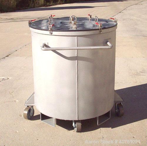 Unused-157 gallon type 304L stainless steel tank. 36" inside diameter x 36" deep. Open top with cover. Flat bottom. On casters. Forklift capable.