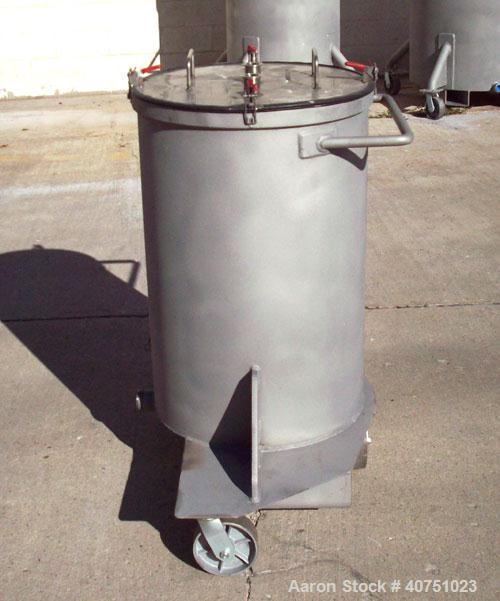 Unused-55 gallon type 304L stainless steel tank. 22" inside diameter x 34" deep. Open top with cover. Flat bottom. On casters. Forklift capable.