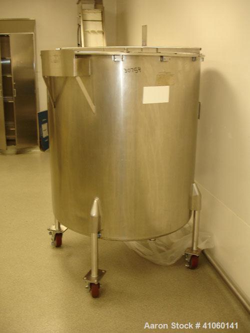 Used Tank, 300 Gallon, Stainless Steel. 44" diameter x 46" straight side, open top with cover, sloping bottom, 1.5" bottom outlet on legs.