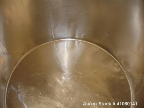 Used Tank, 300 Gallon, Stainless Steel. 44" diameter x 46" straight side, open top with cover, sloping bottom, 1.5" bottom outlet on legs.