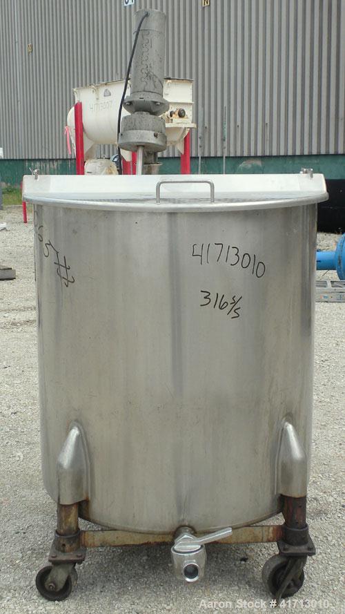 Used Tank, Approximate 140 Gallon, 316 Stainless Steel, Vertical.  34" diameter  x 36" straight side, flat top with hinged cover, sloped bottom.  Includes a clamp on agitator with a 1" diameter shaft...